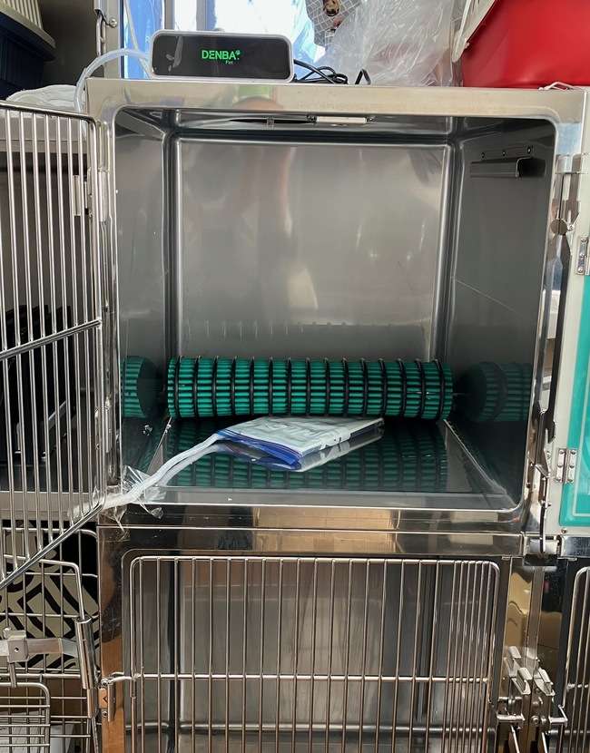 Installed on a veterinary hospital cage